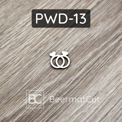 Obrączki wycinane laserowo ze sklejki do dekoracji ślubnych i rękodzieła.