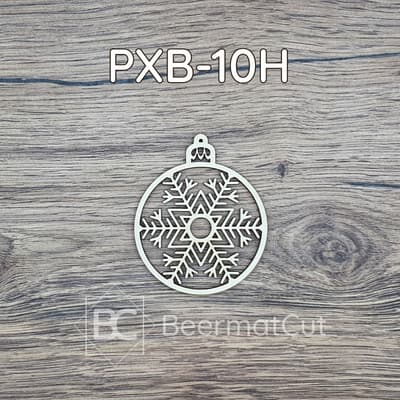 Bombka choinkowa wycinana laserowo ze sklejki z motywem płatka śniegu.